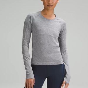 Lululemon swiftly tech long sleeve shirt. Size 8. Color: black and white stripes